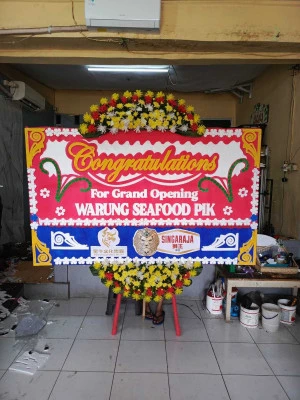 Papan Bunga di Tempel Lelea